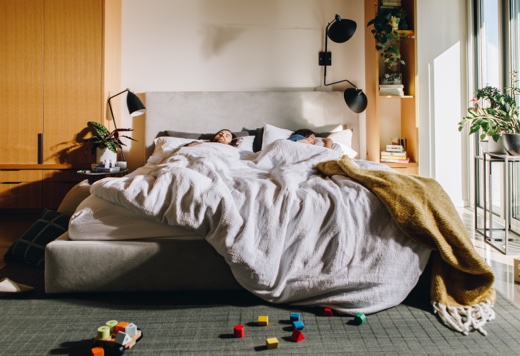 Couple
              sleeping soundly in bed